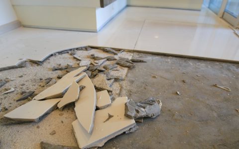 What are your best options for asbestos tiles in basement? We explain both removal and covering solutions.
